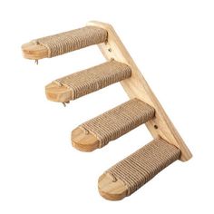 three wooden cat toys on top of each other in the shape of a stair case