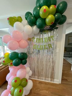 a bunch of balloons that are on the ground