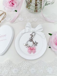 An adorably sweet silver keychain featuring a charming pink bow charm, an angel charm and tiny pearl accent charms.  Add onto your car keys or handbag!  Handemade with love & care. Angel Charm, Silver Keychain, Coquette Pink, Car Keys, Pink Bow, Pink Bag, Keychains, Angel, Silver