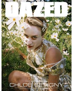 the cover of dazed magazine featuring a woman with white makeup and flowers in her hair