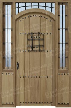 a wooden door with iron bars on the top and side panels, in front of a white background