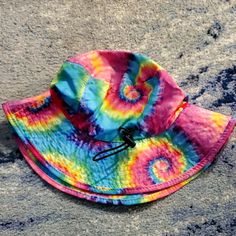 Such A Cute Bucket Hat! Rainbow Tie Dye Pattern With Am Adjustable Tie Under For Your Neck :) Perfect For Getting Wet And Drying Easily For All Summer Events. Or Wear To A Festival For A Fun Accessory. Never Worn Pink Adjustable Fit Sun Hat For The Beach, Adjustable Fit Pink Sun Hat For The Beach, Pink Adjustable Beach Sun Hat, Pink Adjustable Sun Hat For Summer, Pink Adjustable Fit Hat For Beach, Pink Adjustable Summer Hat, Pink Adjustable Beach Hat, Pink Adjustable Summer Sun Hat, Adjustable Pink Bucket Hat For Beach