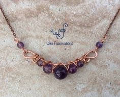 This handmade necklace is copper wire wrapped amethyst beads of various sizes in a beautiful criss cross pattern. The hook and eye clasp is also made by hand from copper wire. This is a versatile and eye catching design suitable for any occasio... Homemade Jewellery, Criss Cross Pattern, Necklace Organizer, Wire Jewelry Designs, Long Necklaces, Wire Necklace, Jewellery Shop