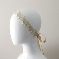 "Beautiful and lovely light gold beaded lace head tie made of 1.5\" light gold beaded flower lace (18\") with satin ribbon. Satin ribbon color available in ivory and champagne. Soft and warm looking. ❤ 1.5\" Light gold beaded lace portion 18\" ❤ 3/8\" Satin ribbon ( ivory & champagne ) If you have any questions please feel free to contact me. Thanks :) ♥ ♥ ♥ ♥ ♥ ♥ ♥ ♥ ♥ ♥ ♥ ♥ ♥ ♥ See more by lovelikestyle lovelikestyle.etsy.com ♥ ♥ ♥ ♥ ♥ ♥ ♥ ♥ ♥ ♥ ♥ ♥ ♥ ♥" Gold Beaded Wedding Headpieces, Adjustable Beaded Wedding Headpieces, Adjustable Beaded Headpiece For Wedding, Adjustable Lace Bridal Accessories For Ceremony, Adjustable Beige Headpieces For Wedding, Adjustable Gold Hair Accessories For Gifts, Gold Headband Hair Accessories Gift, Elegant Ribbon Headband For Wedding, Gold Hair Accessories With Matching Headband As Gift