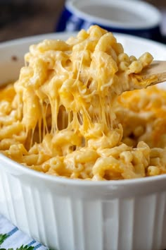 a white bowl filled with macaroni and cheese