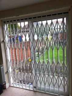 an image of a glass door that looks like it has been opened to let in some light