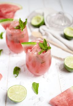 watermelon mojitas with mint and lime garnish on a white table