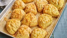 a pan filled with biscuits on top of a table