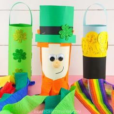 three st patrick's day crafts made out of toilet paper and colored tissue rolls