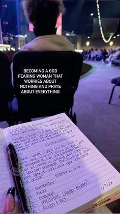 a notepad sitting on top of a table next to a pen