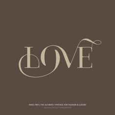 the word love is written in brown and white on a dark background with an ornate font