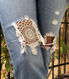 the jeans are ripped with holes and crochet on them, but there is no lace