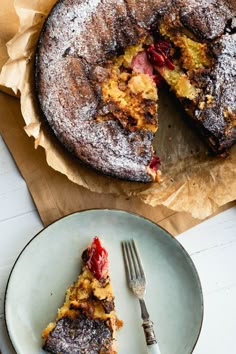 a piece of cake sitting on top of a plate next to a knife and fork