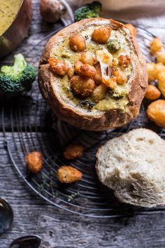 bread with broccoli and chickpeas in it sitting on a wire rack