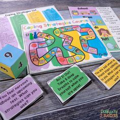 a board game with cards and dices sitting on a table