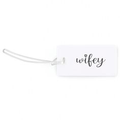 Buy the Hortense B. Hewitt Co.™ Wifey Luggage Tag at Michaels. com. Newlyweds will love using this wifey luggage tag on a suitcase when traveling for the honeymoon! It adds a cute touch to their new future! Newlyweds will love using this wifey luggage tag on a suitcase when traveling for the honeymoon! It adds a cute touch to their new future! Details: White with black silkscreened ink 2.5" x 4.5" 1 luggage tag Clear plastic loop attached Blank information card included | Hortense B. Hewitt Co. Save The Date Luggage Tags, Mr And Mrs Luggage Tags, Personalized White Luggage Tag For Travel, Personalized White Rectangular Luggage Tag, Cheap Personalized Rectangular Luggage Tag, Luggage Tags, Dog Tag Necklace, Wedding Gifts, Gifts