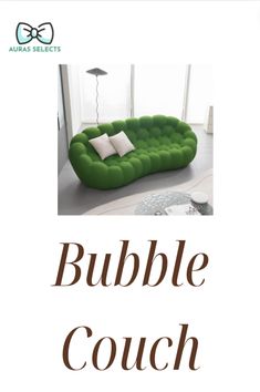 a green couch sitting on top of a white floor