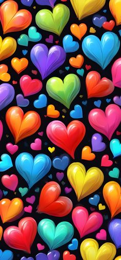 many different colored hearts on a black background