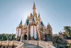 the entrance to sleeping beauty castle at disney world