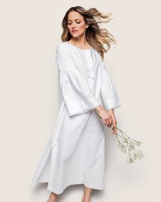 Classic white never goes out of style. Crisp, versatile, and always on-trend. The effortless Seraphine nightgown unites comfort and grace in a supple lightweight flannel. Soft bell sleeves, button detail and an a-line silhouette. The fabric is made from 100% of the finest quality cotton. It is yarn-dyed to prevent fade and brushed for added softness making the sleepwear feel absolutely luxurious, getting cozier after each wash. You will be tucked in luxury and off to dreamland. Bonne nuit. White Flannel, Flannel Women, Shoe Size Conversion, Shoe Size Chart, Getting Cozy, Button Detail, Yarn Dyeing, Out Of Style, Classic White