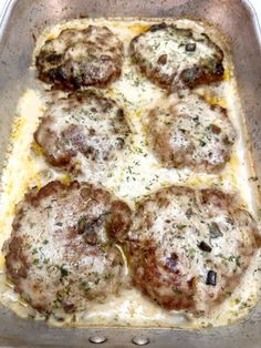 a pan filled with meatballs covered in cheese