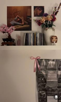 two shelves with pictures, vases and flowers on top of each shelf in front of the bookshelf