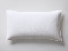 a white pillow on a white background