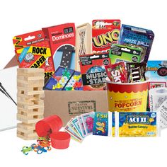 an assortment of toys and games in a cardboard box with the contents labelled on it