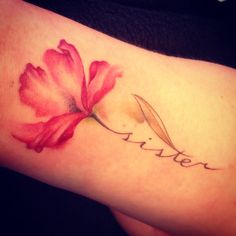 a woman's arm with a flower on it and the word sister written in cursive writing