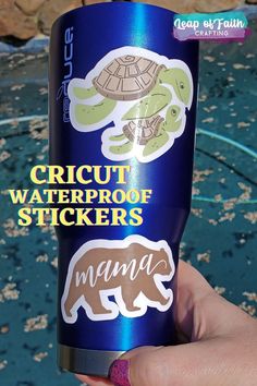 a hand holding a blue cup with stickers on it and the words cricut waterproof stickers