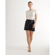 It's mini in length but maximum style points. The washable silk mini skirt is made from 100% washable mulberry silk in a satin finish. Pairs perfectly with our silk cami and has a hidden elastic waistband for easy fit. | Quince | Women's Washable Silk Mini Skirt in Black, Size Large, Mulberry Silk Quince Silk Skirt, Quince Skirt, Silk Mini Skirt Outfit, Black Silk Mini Skirt, Black Mulberry, Nyc Closet, Silk Mini Skirt, Silk Cami, Alpaca Sweater