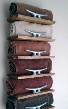 towel rack made out of wood and metal handles