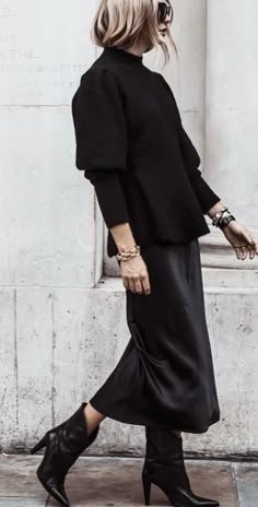 Satin Midi Skirt Cowboy Boots, Monochrome Skirt Outfit, Black Leather Midi Skirt Outfit Winter, Black Midi Slip Skirt Outfit, Black Slip Skirt Outfit Winter, Black Satin Skirt Outfit Winter, Black Slip Skirt Outfit, Leather Midi Skirt Outfit, Midi Skirt Outfit Winter