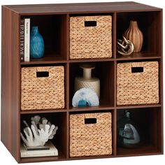 a shelf with baskets and books on it