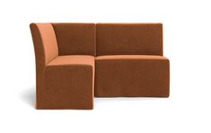 a brown couch sitting on top of a white floor next to an orange ottoman chair