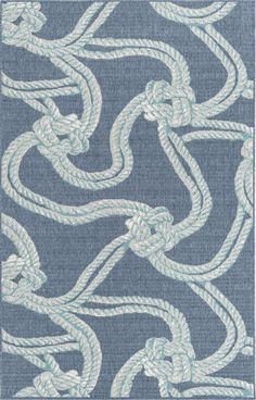 a blue rug with white rope on it