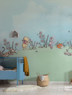 a child's room decorated with winnie the pooh wall decals