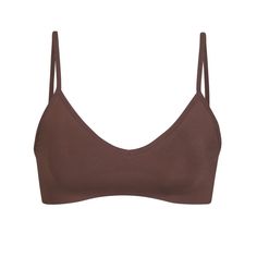 Shop SKIMS women's bralettes and bralette tops in a variety of styles, sizes and colors. Free shipping on purchases of $75 and international shipping available. Comfortable Bras, Black Bralette, Seamless Bra, Bralette Tops, Retail Therapy, Deep V Neck, Summer Looks, Deep V, Pullover Styling