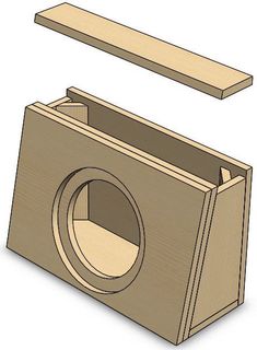 a wooden object with a hole in the middle and a piece of wood above it