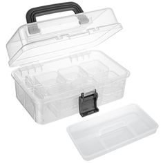 an open plastic tool box with lid and latches on the side, sitting next to another container