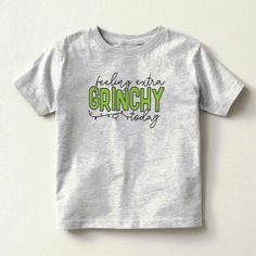 The holidays will not be complete without The Grinch! HOW THE GRINCH STOLE CHRISTMAS is a classic story of a town called Who-ville and how the Christmas spirit can melt even the coldest of hearts. Green Arrow Logo, Happy Birthday Kids, Toddler Tops, Santa's Little Helper, Toddler Christmas, Holiday Wardrobe, Toddler Gifts, Funny T, Christmas Tshirts