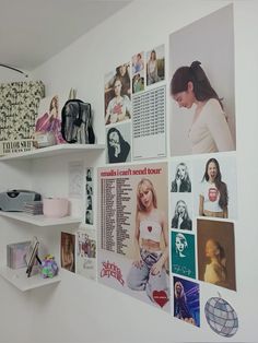 there are many pictures on the wall in this room, including women's clothing