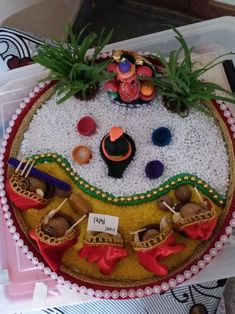 there is a cake that has been decorated with various things on the top and bottom