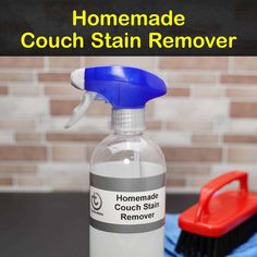 the homemade couch stain remover is sitting on top of a table next to a brush