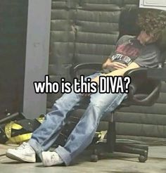 a man sitting in an office chair with his feet on the desk and texting who is this dva?