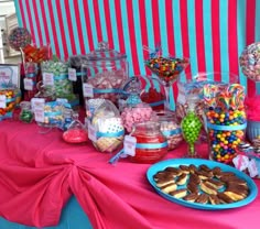 a table topped with lots of candy and candies