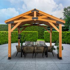 a wooden gazebo sitting on top of a patio