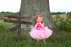 How cute is this piglet dress!! Oh so cute!!! Perfect for Halloween,dress up, birthdays,and special events! This dress is made knee length,you dont have to leave a measurement,but if you choose to please leave a measurement from armpit to desired length. Checkout our shop for our Winnie the Pooh,and Tigger Design!!! Ears are NOT included but can be added on from the drop down menu.(Ears may vary in style depending on stock) Exclusive Design to Pink Toes & Hair Bows Pooh And Piglet Halloween Costumes, Toddler Piglet Costume, Piglet Baby Costume, Winnie The Pooh Tutu Costumes, Piglet Costume Diy, Pregnant Winnie The Pooh Costume, Toddler Girl Pig Costume, Piglet Birthday, Piglet Costume