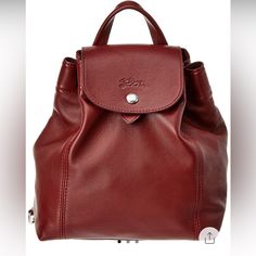 Longchamp Le Pliage Cuir Leather Backpack. Color: Red Lacquer. See Picture For Description And Sizing Information. Discontinued Style. Brand New And Has Dust Bag. Luxury Red Leather Backpack, Luxury Red Leather Standard Backpack, Classic Red Leather Everyday Backpack, Classic Red Leather Backpack For Everyday, Classic Red Backpack, Classic Red Leather Backpack, Luxury Red Backpack For Travel, Luxury Red Bag With Snap Closure, Classic Formal Backpack With Dust Bag