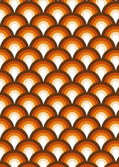 an orange and white pattern with circles on the top, as if it was made out of